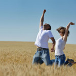 romantic couple jumping